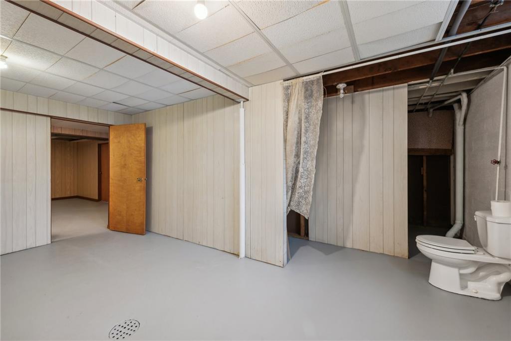 2480 Lynnrose Drive Irwin, PA 15642 - Photo 24 of 39 a view of an empty room with toilet and a window