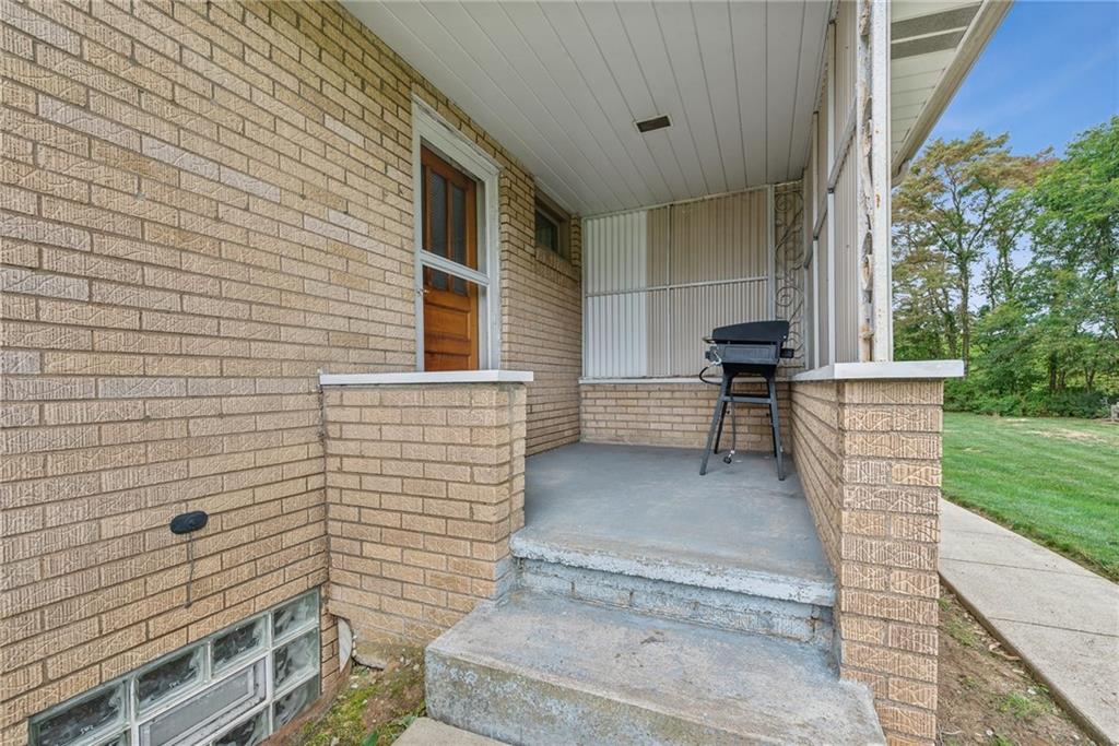 2480 Lynnrose Drive Irwin, PA 15642 - Photo 27 of 39 a view of house with backyard and garden