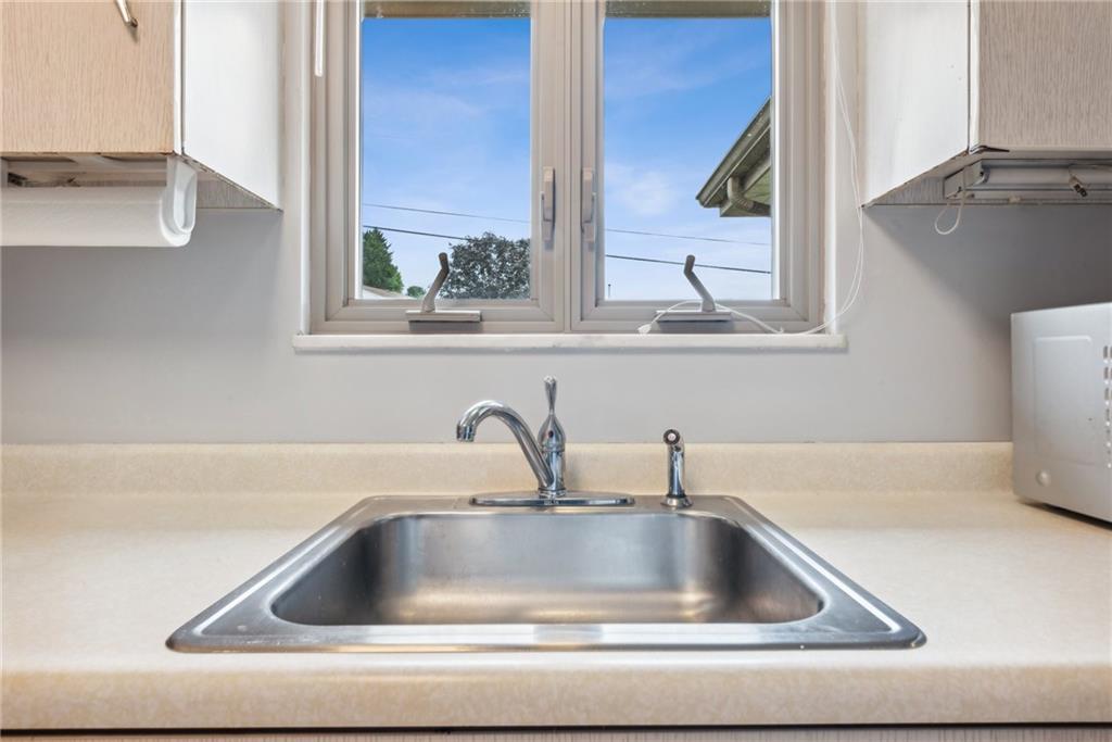 2480 Lynnrose Drive Irwin, PA 15642 - Photo 28 of 39 a view closed with a sink and mirror