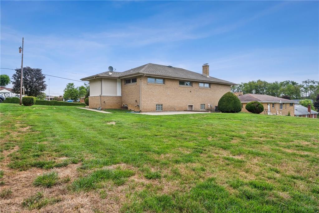 2480 Lynnrose Drive Irwin, PA 15642 - Photo 33 of 39 a view of a house with a yard