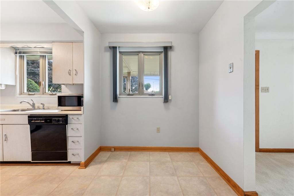 2480 Lynnrose Drive Irwin, PA 15642 - Photo 7 of 39 a view of a kitchen with a sink and a window