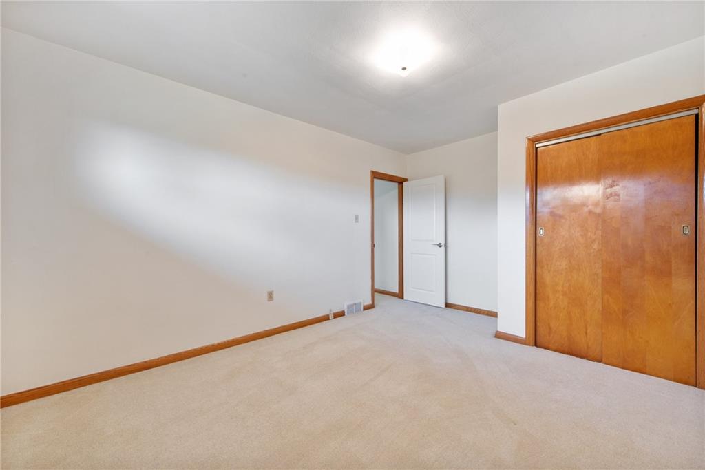 2480 Lynnrose Drive Irwin, PA 15642 - Photo 9 of 39 an empty room with a natural light