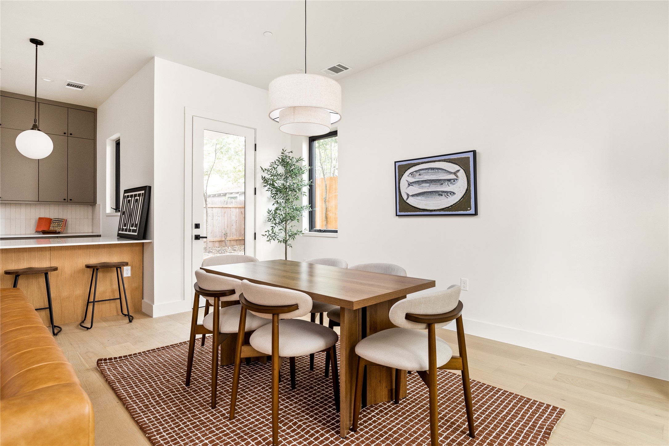 4414 South 1st Street, Unit 3 Austin, TX 78745 - Photo 12 of 39 Dining space featuring light wood finished floors