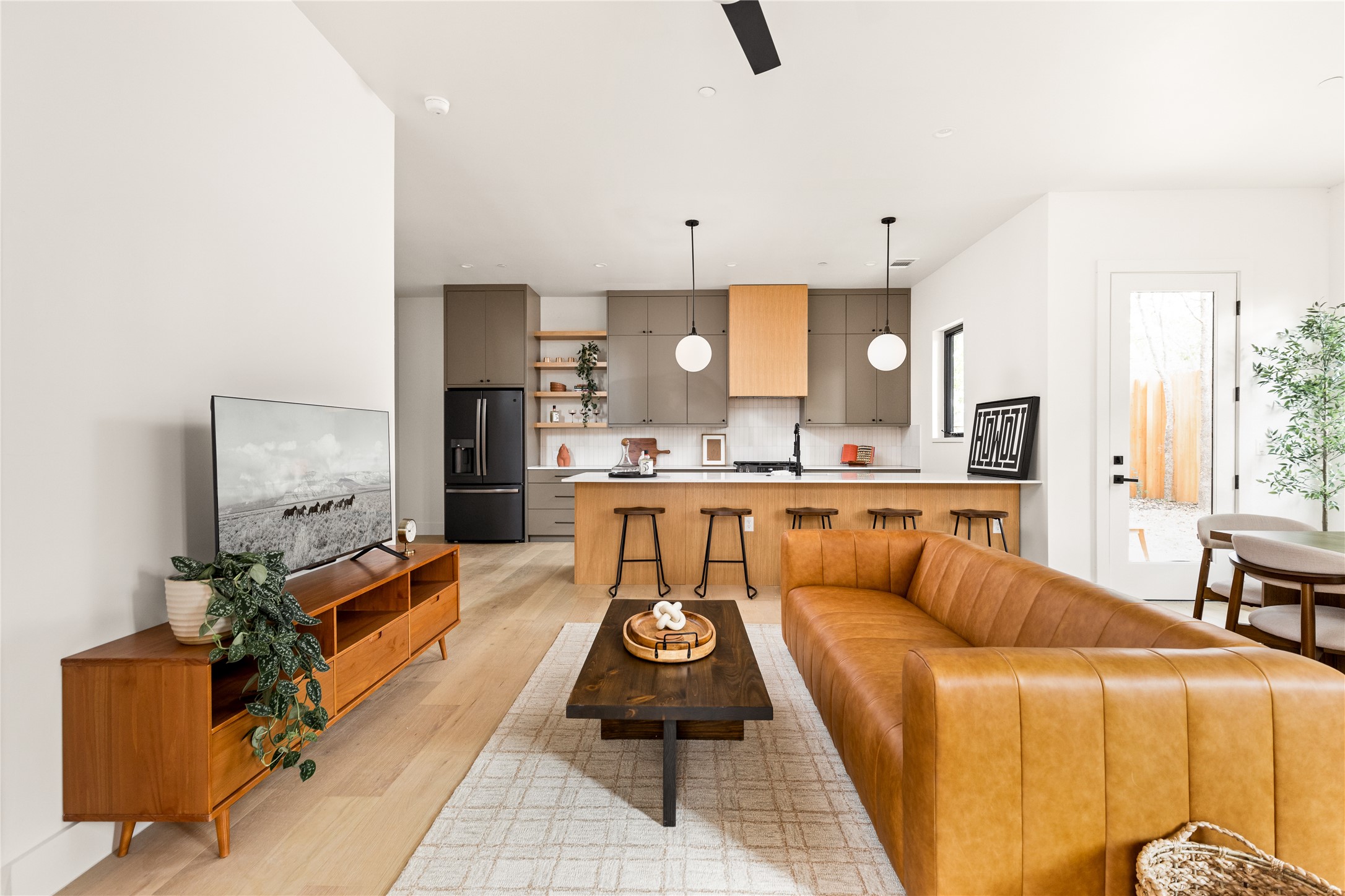 4414 South 1st Street, Unit 3 Austin, TX 78745 - Photo 2 of 39 Living room with light wood-type flooring and ceiling fan