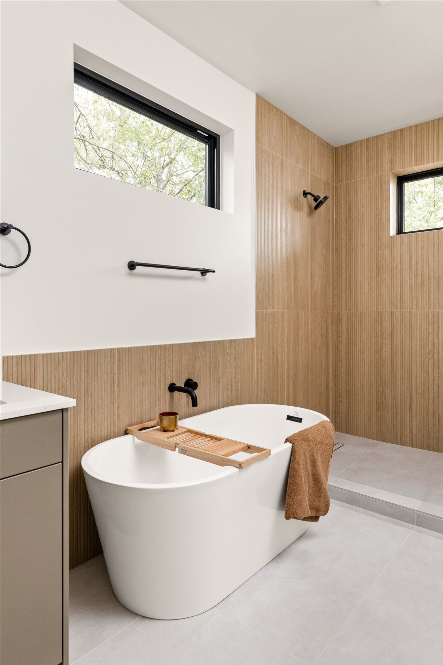 4414 South 1st Street, Unit 3 Austin, TX 78745 - Photo 26 of 39 Full bathroom featuring a tile shower, vanity, and a soaking tub