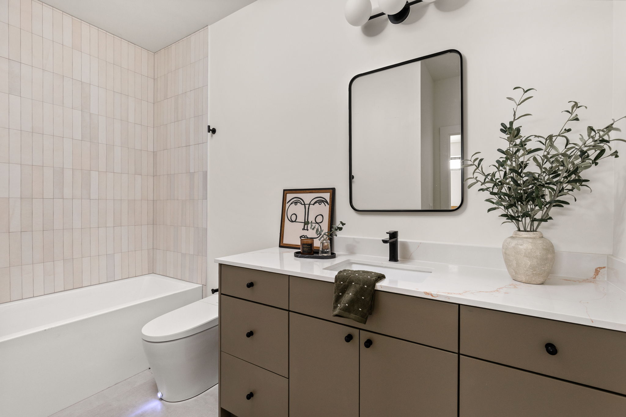 4414 South 1st Street, Unit 3 Austin, TX 78745 - Photo 30 of 39 Bathroom with vanity and shower / washtub combination