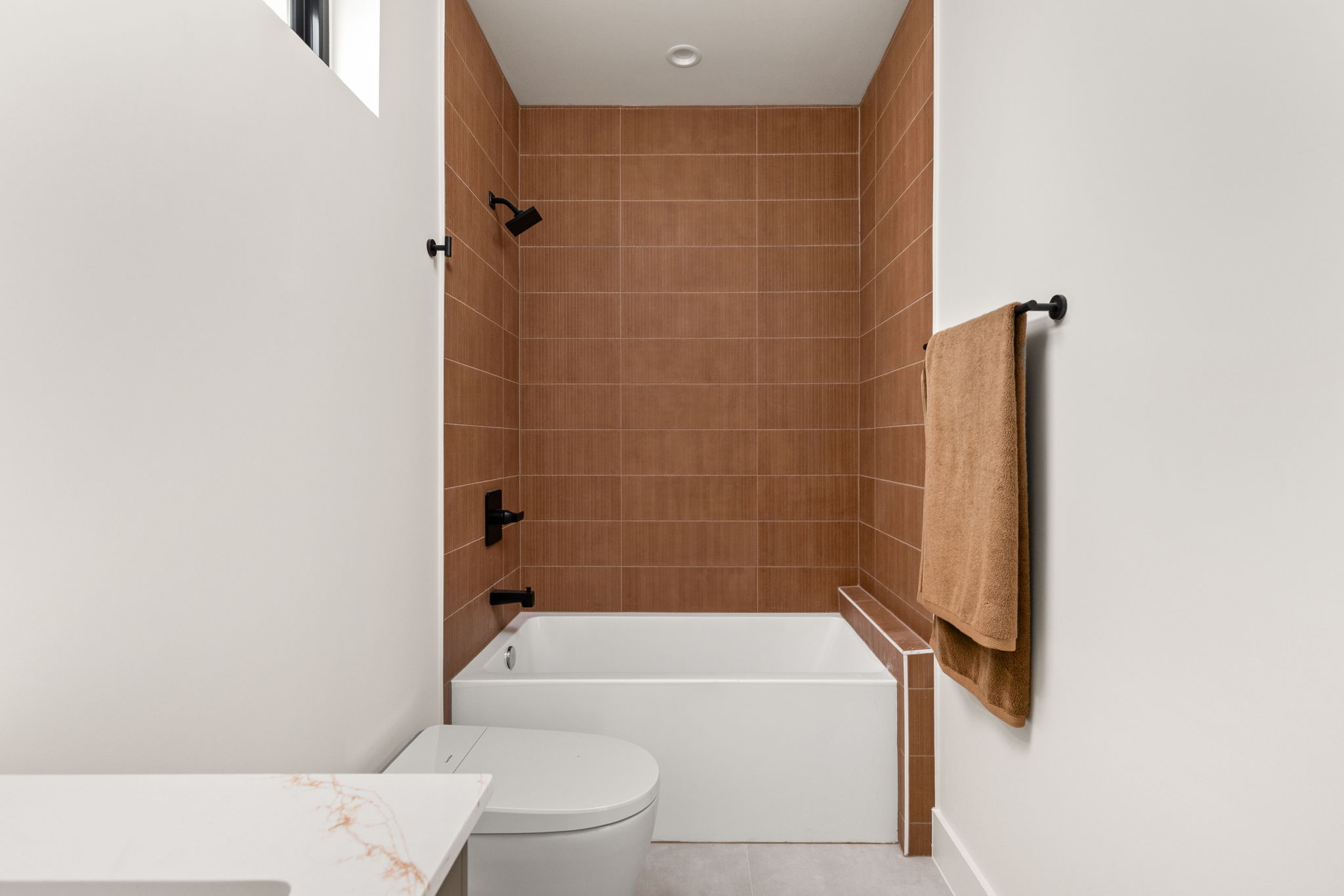 4414 South 1st Street, Unit 3 Austin, TX 78745 - Photo 32 of 39 Full bath featuring vanity, tub / shower combination, and tile patterned flooring