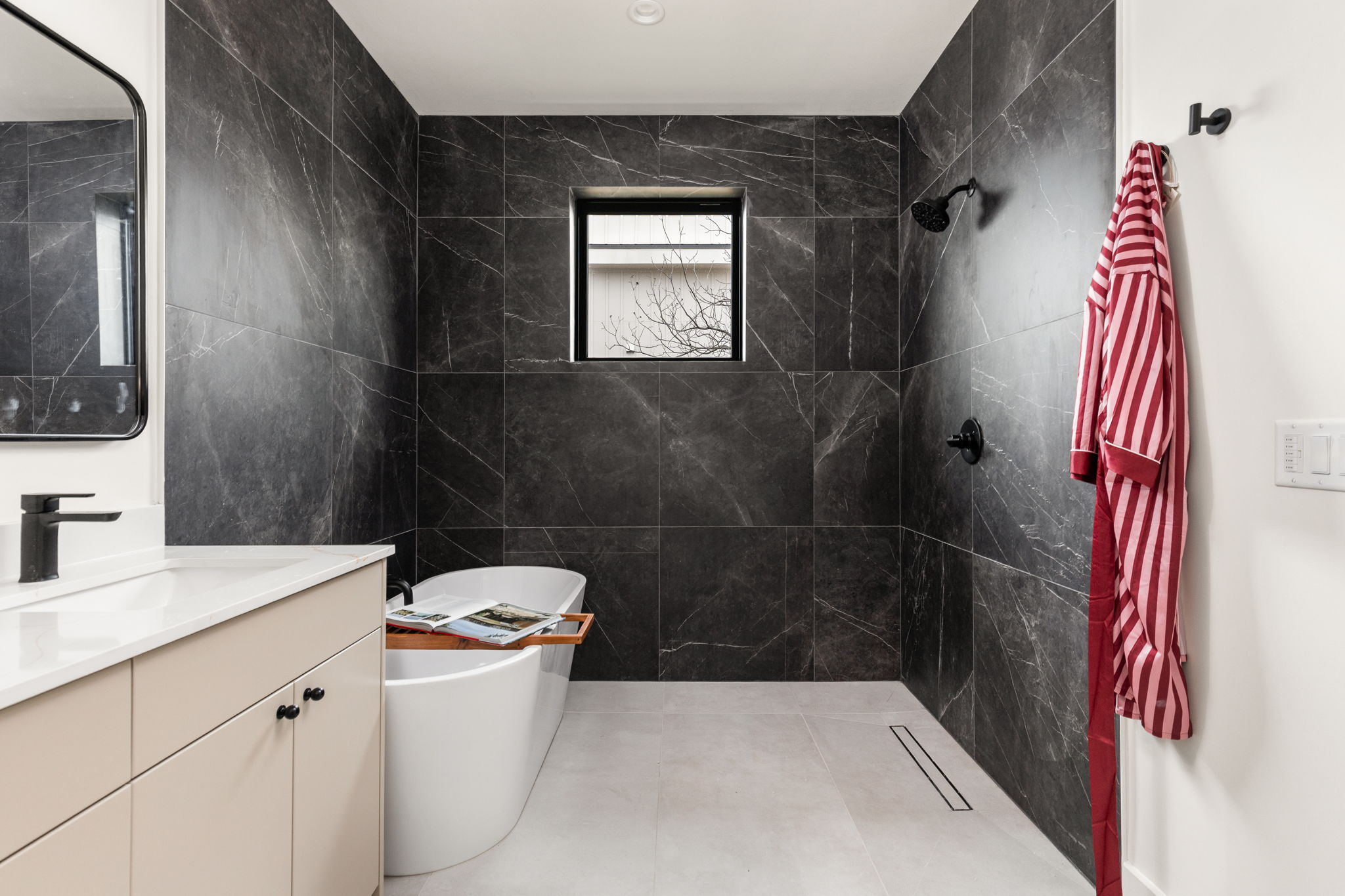 4414 South 1st Street, Unit 3 Austin, TX 78745 - Photo 35 of 39 Full bathroom featuring vanity, tiled shower, tile walls, and a soaking tub