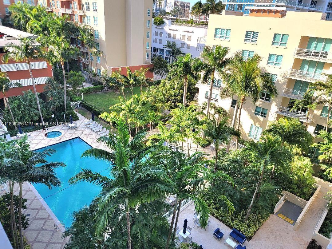 2000 North Bayshore Drive, Unit 226 Miami, FL 33137 - Photo 10 of 15 a view of a yard with plants and large trees