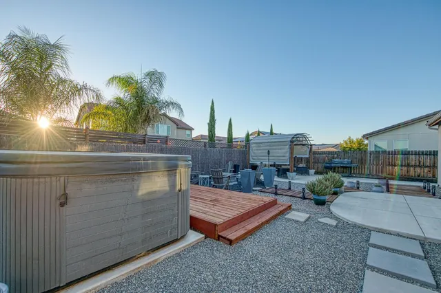 a terrace with a table and chairs