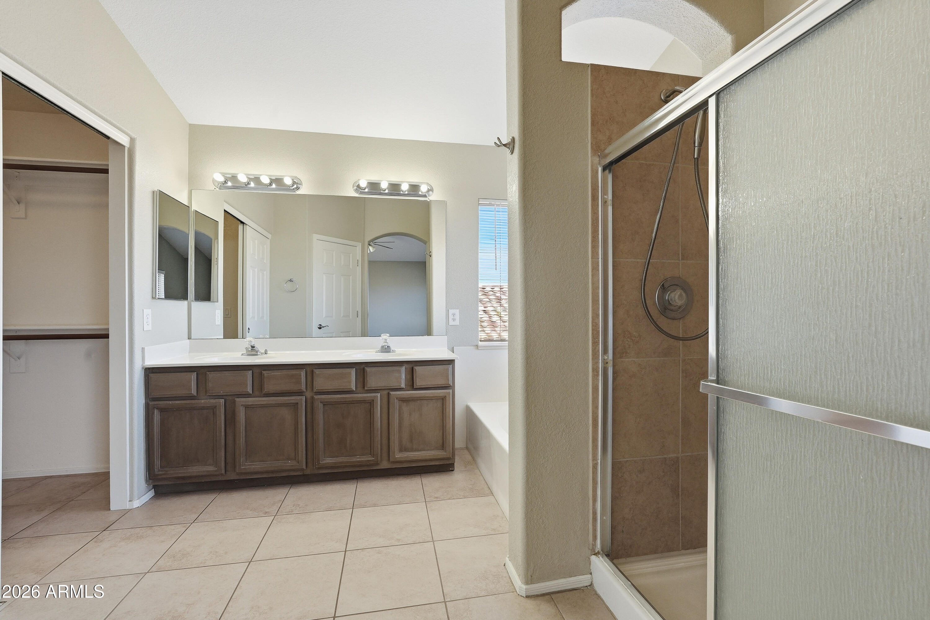 2840 East Wagoner Road Phoenix, AZ 85032 - Photo 27 of 34 a large bathroom with a double vanity sink and a mirror