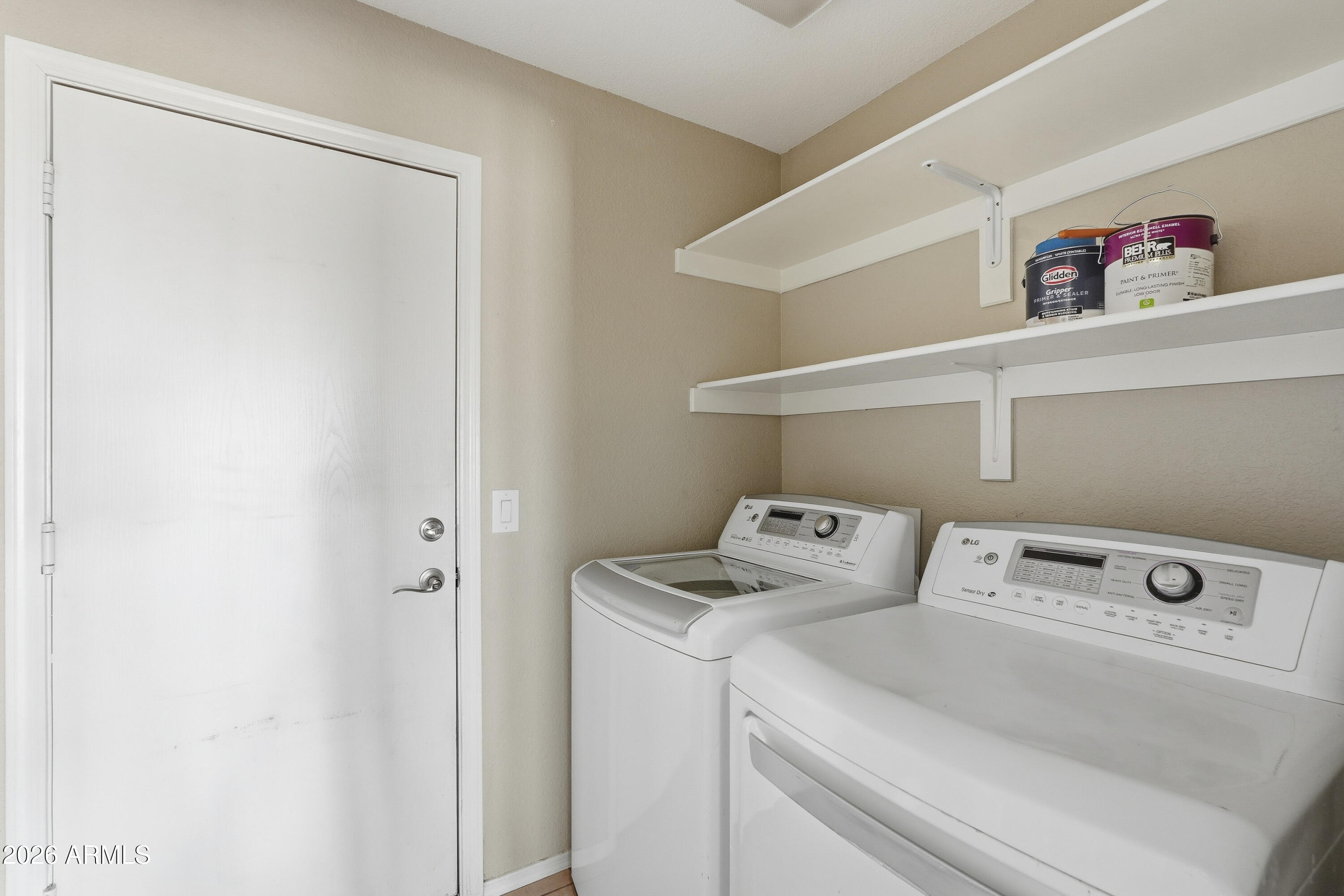2840 East Wagoner Road Phoenix, AZ 85032 - Photo 30 of 34 a utility room with dryer and washer