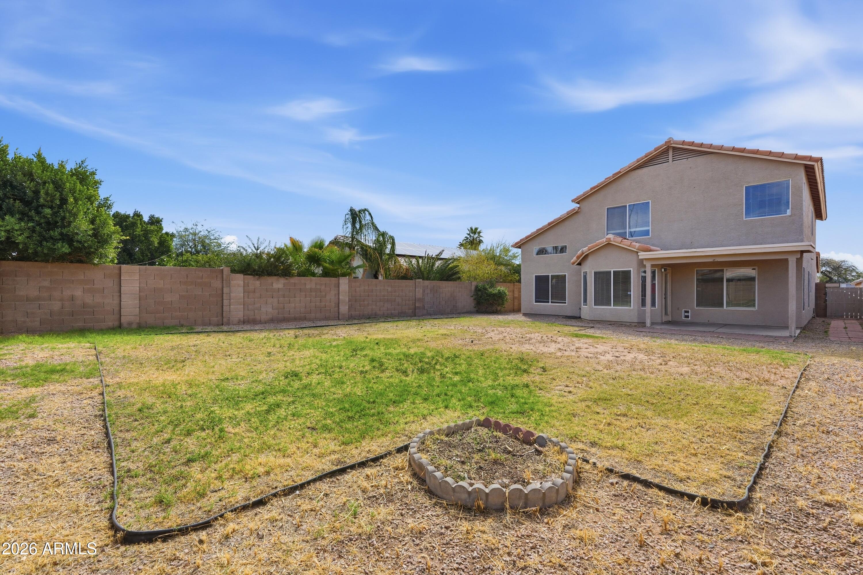 2840 East Wagoner Road Phoenix, AZ 85032 - Photo 33 of 34 a front view of a house with a yard