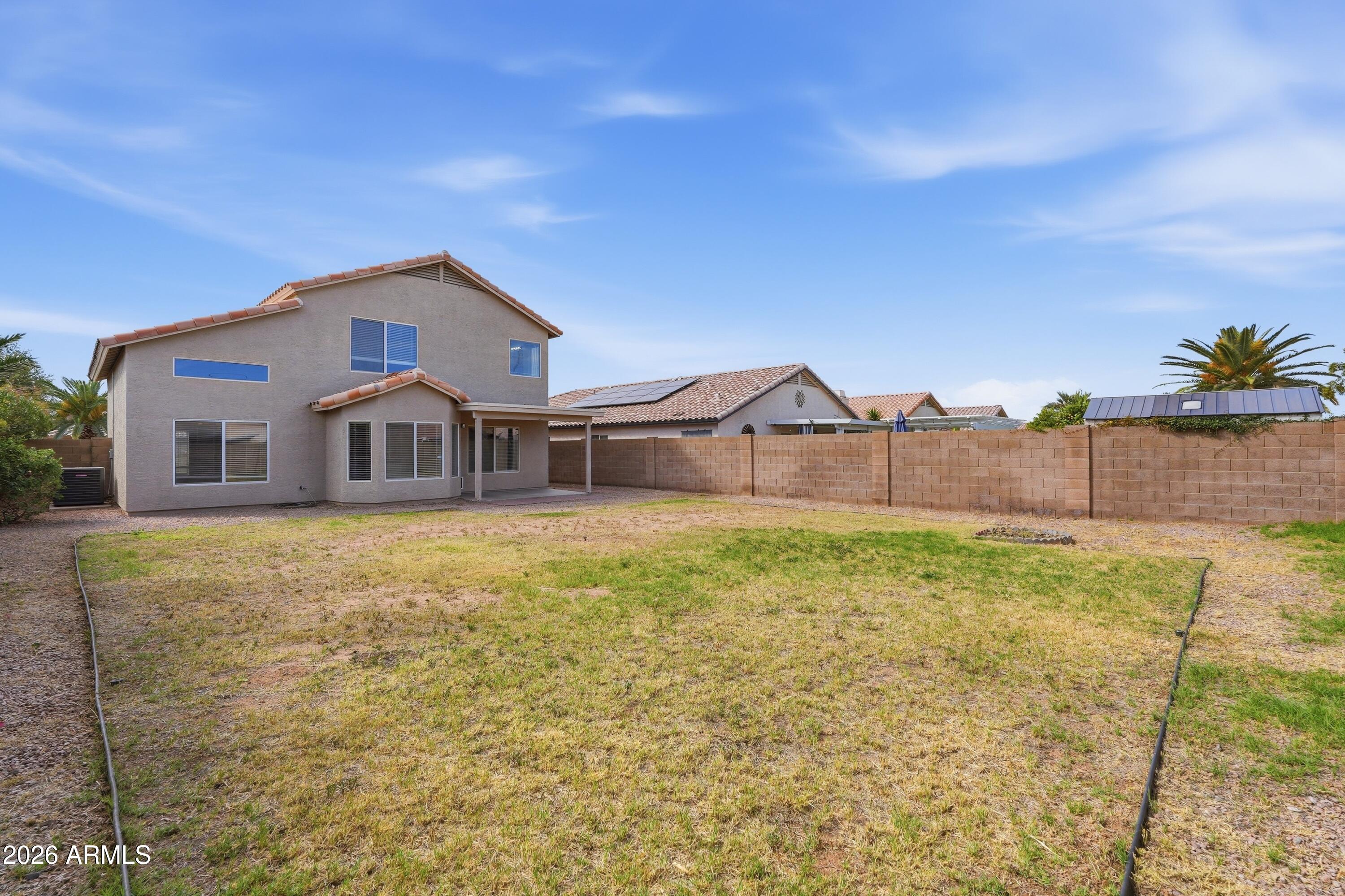 2840 East Wagoner Road Phoenix, AZ 85032 - Photo 34 of 34 a front view of a house with a yard