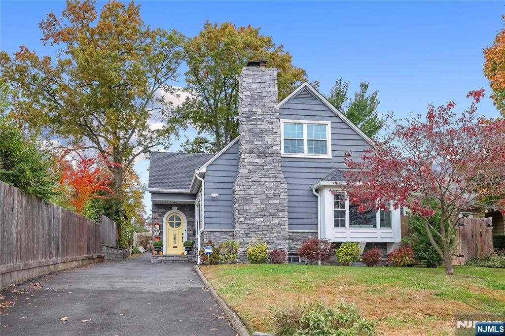 165 Pine Street Hackensack, NJ 07601 - Photo 1 of 41 front view of a house with a yard