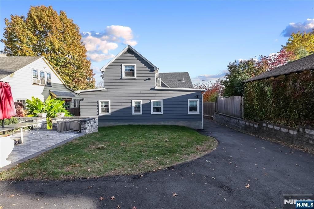 165 Pine Street Hackensack, NJ 07601 - Photo 34 of 41 a view of a house with a yard