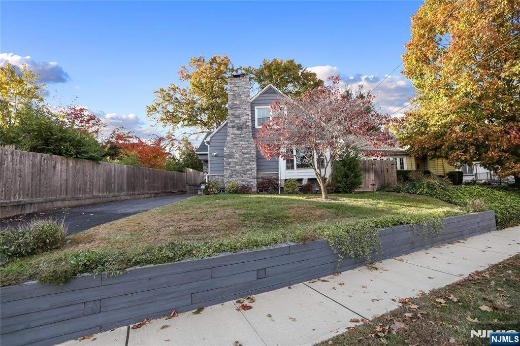165 Pine Street Hackensack, NJ 07601 - Photo 39 of 41 front view of a house with a yard