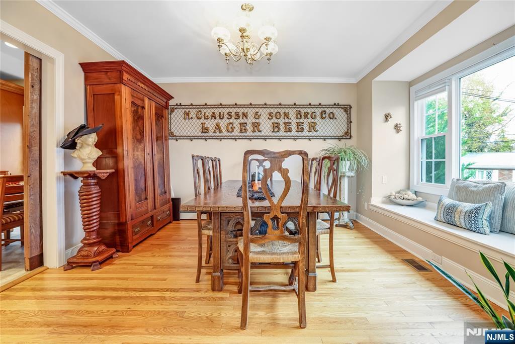 165 Pine Street Hackensack, NJ 07601 - Photo 7 of 41 a view of a dining room with furniture window and wooden floor