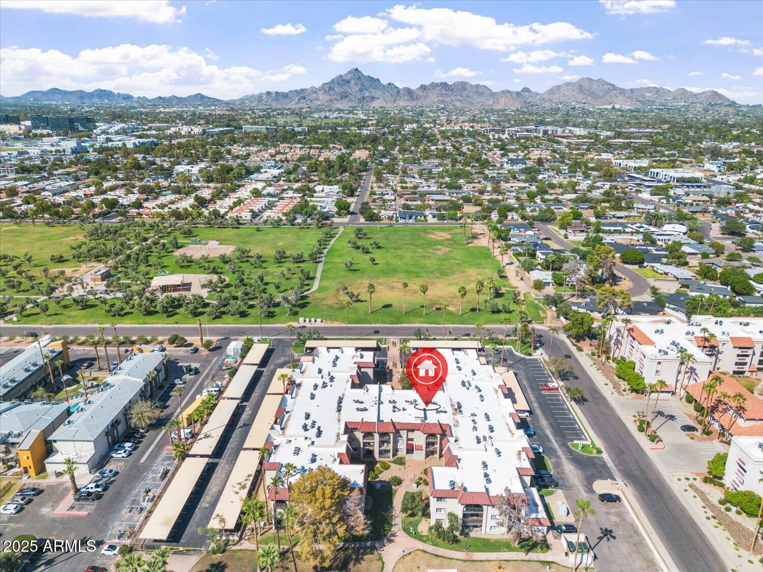 3033 East Devonshire Avenue, Unit 2003 Phoenix, AZ 85016 - Photo 22 of 32 an aerial view of residential houses with outdoor space