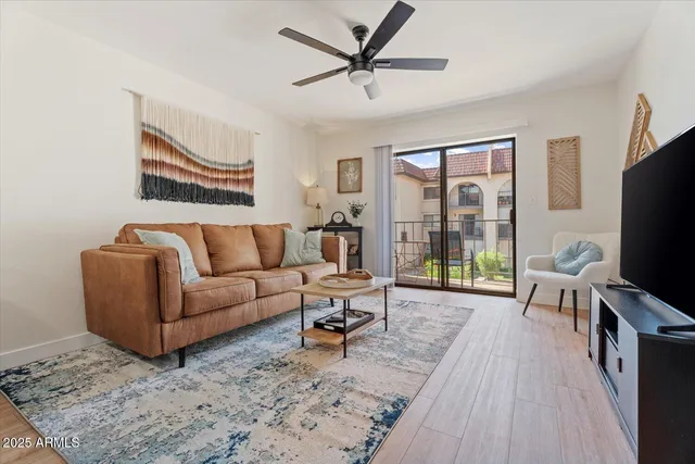 a front view of a house with yard and green space