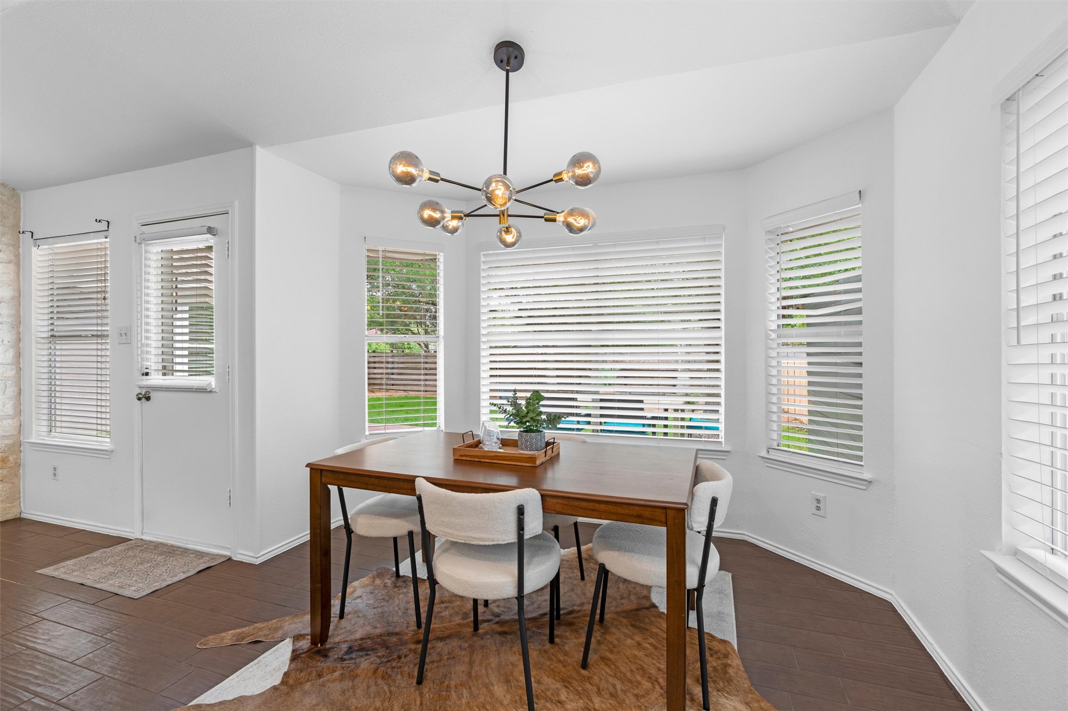 9305 Lightwood Loop Austin, TX 78748 - Photo 15 of 40 a dining room with furniture and window
