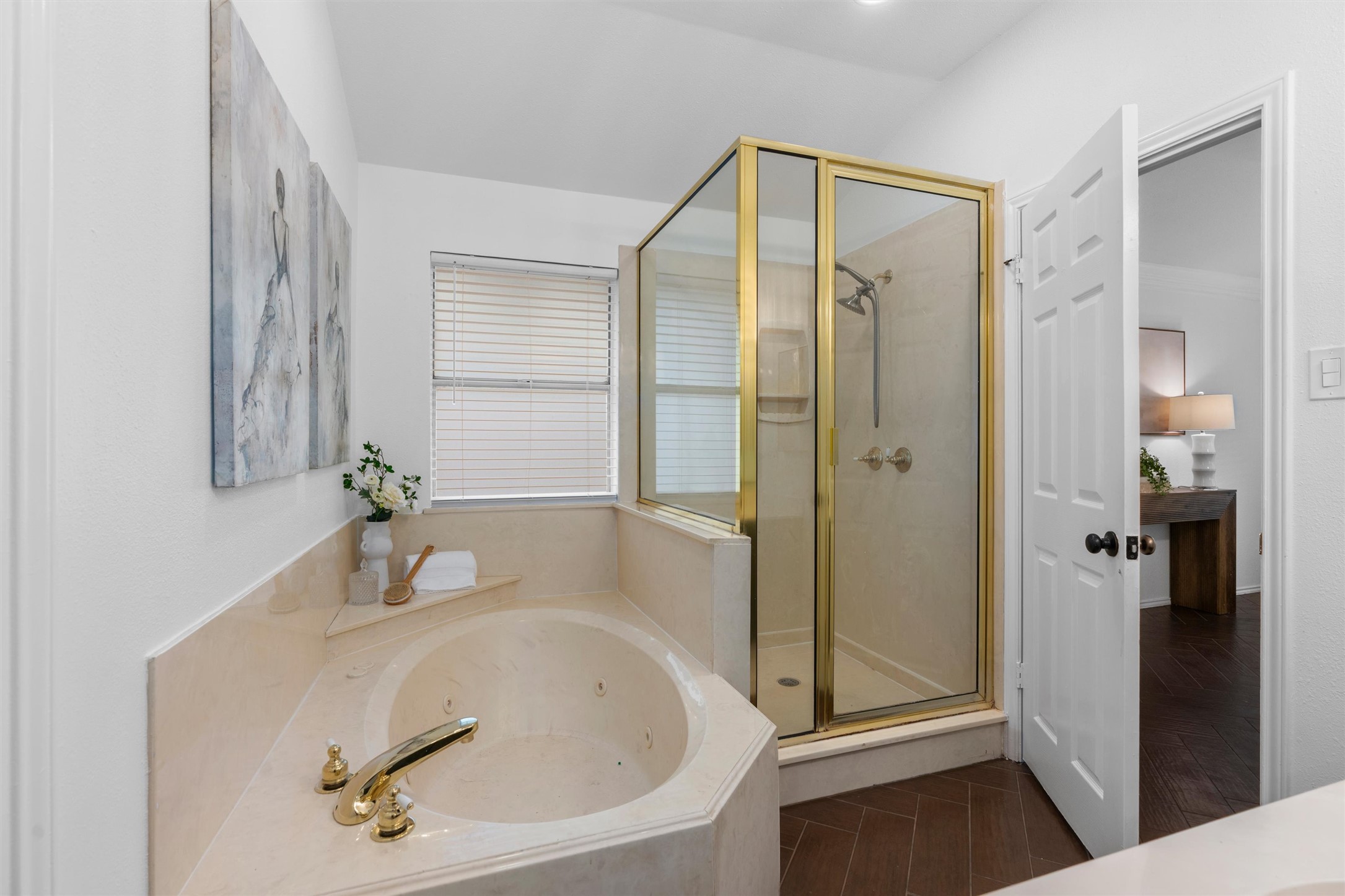 9305 Lightwood Loop Austin, TX 78748 - Photo 20 of 40 a bathroom with a tub and shower