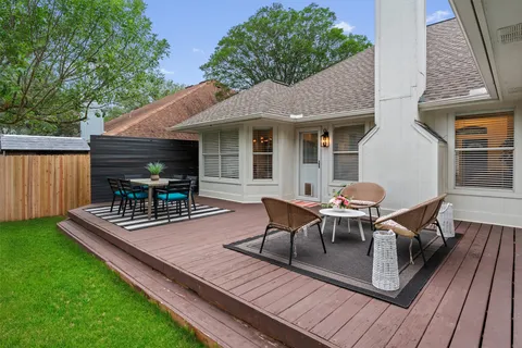 a view of a table and chairs in the patio
