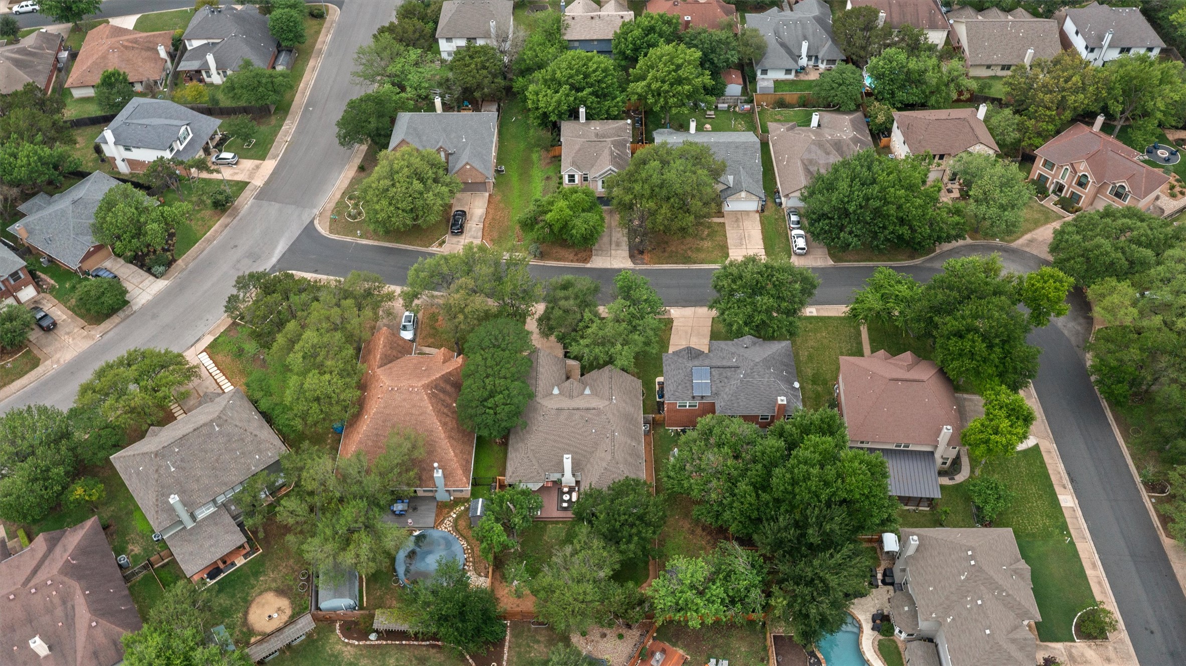 9305 Lightwood Loop Austin, TX 78748 - Photo 38 of 40 an aerial view of a house with a yard and lake view