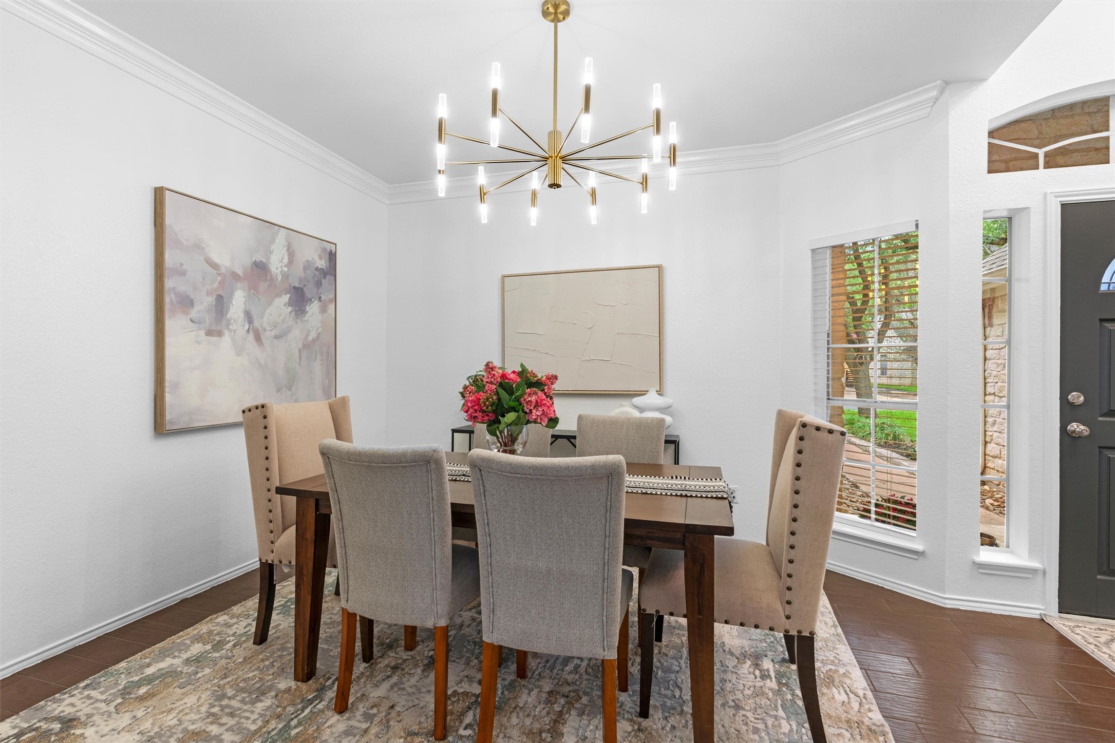 9305 Lightwood Loop Austin, TX 78748 - Photo 4 of 40 a view of a dining room with furniture window and wooden floor