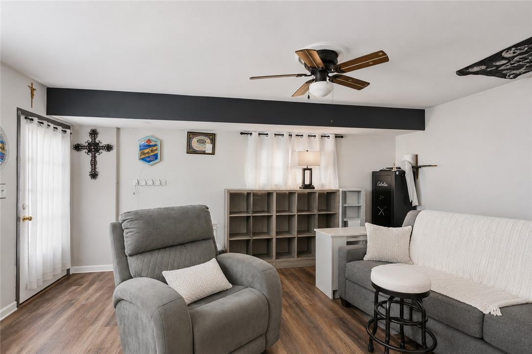 2649 Nottingham Road Bethlehem, PA 18017 - Photo 29 of 49 A relaxed living area boasts easy-care laminate flooring and a comforting ceiling fan for year-round enjoyment.