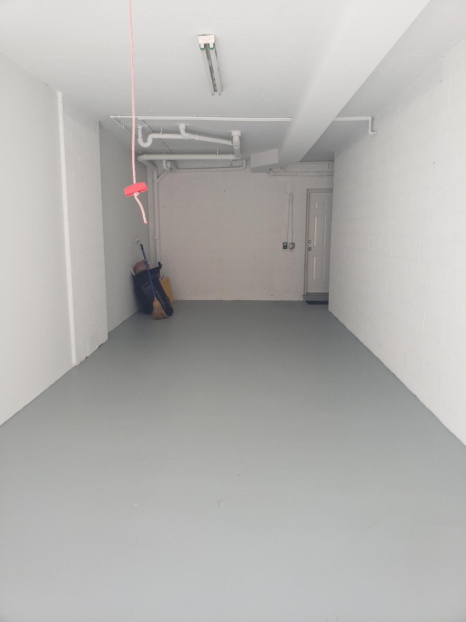 909 Belmont Place, Unit 909 Boynton Beach, FL 33436 - Photo 26 of 26 a view of a garage