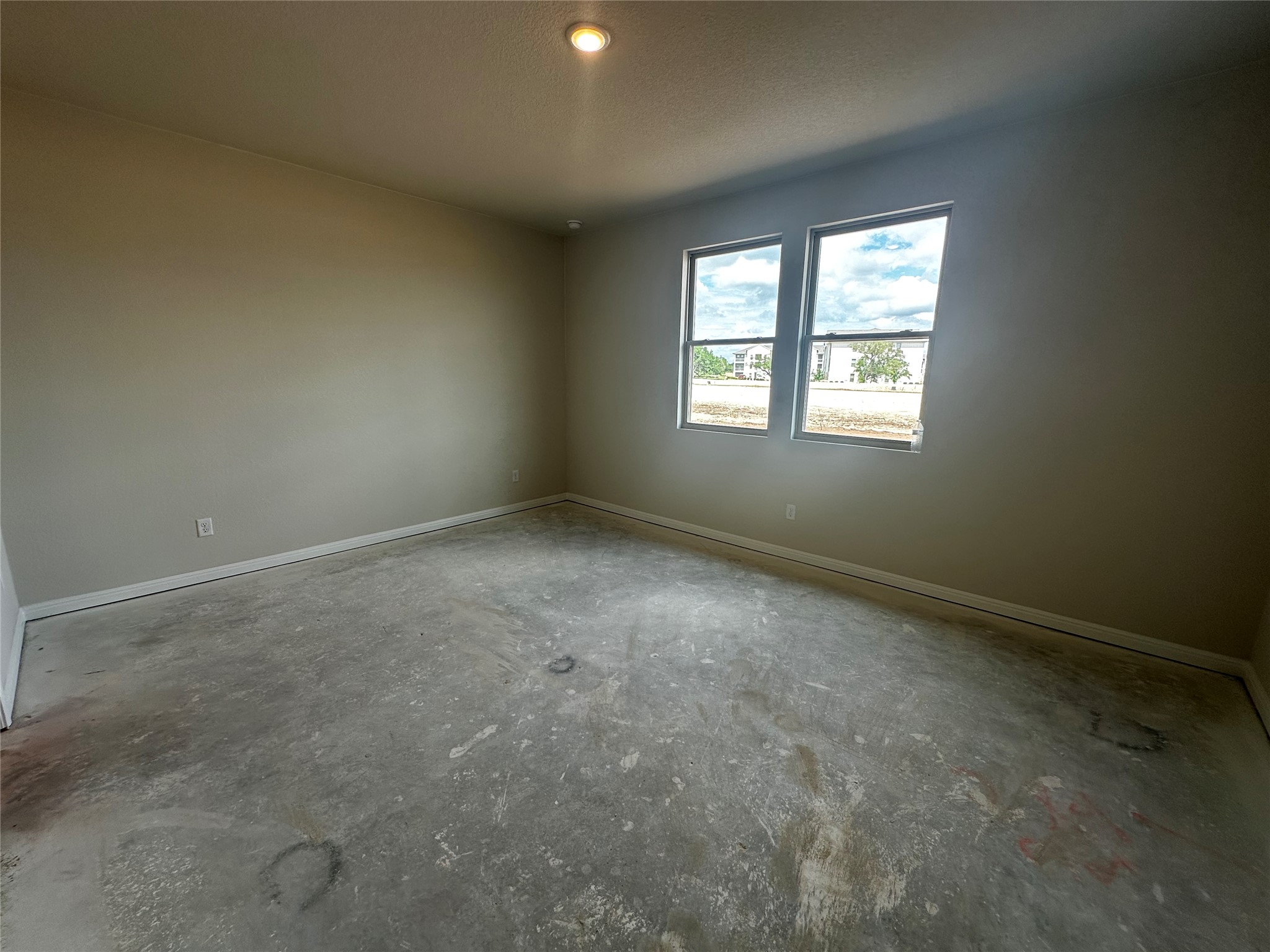 1053 Sienna Bear Road Georgetown, TX 78633 - Photo 12 of 32 an empty room with a window