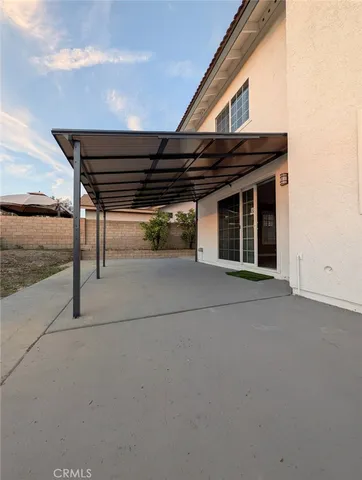 a view of backyard with cabin