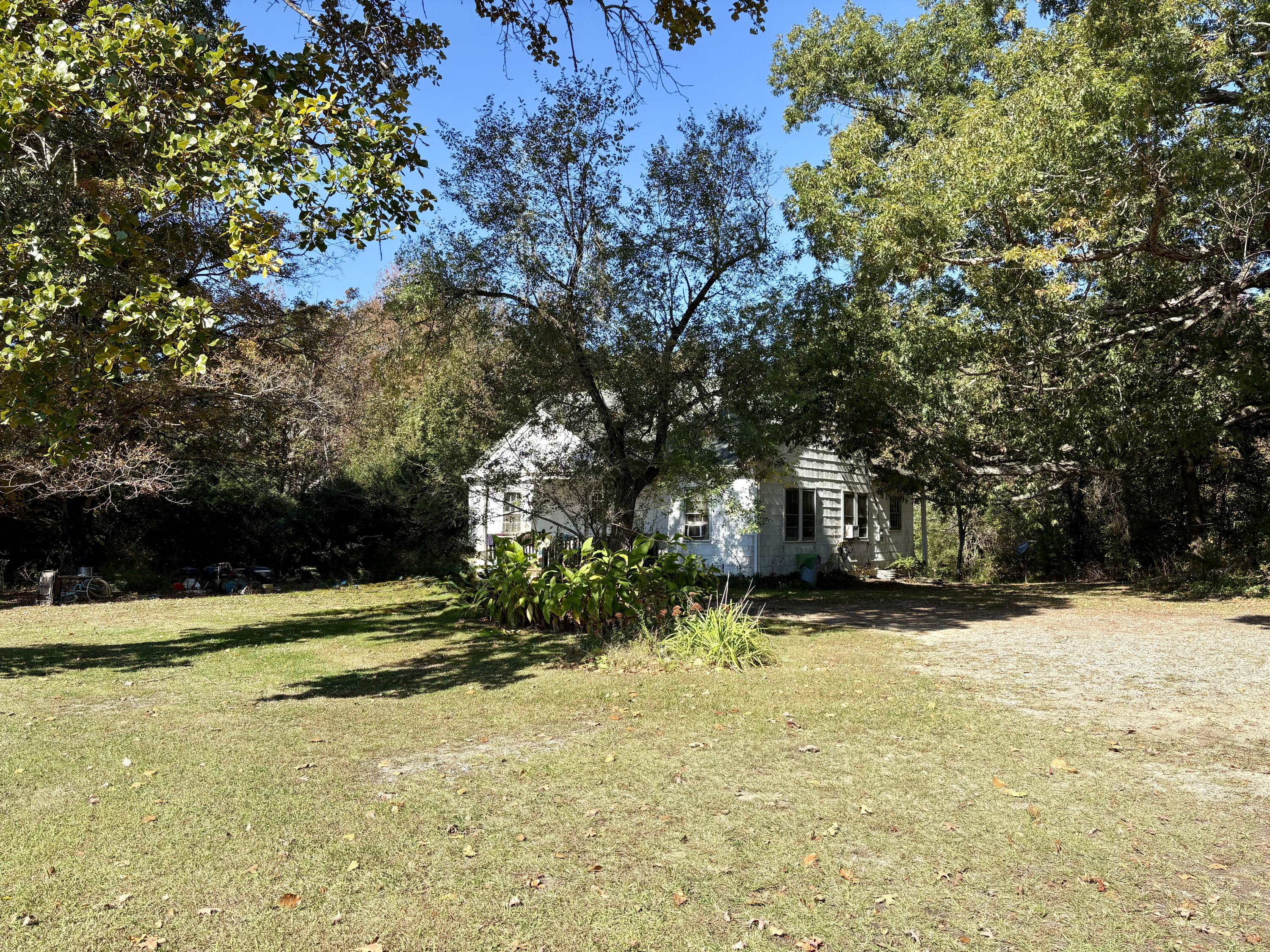 a view of swimming pool with a yard