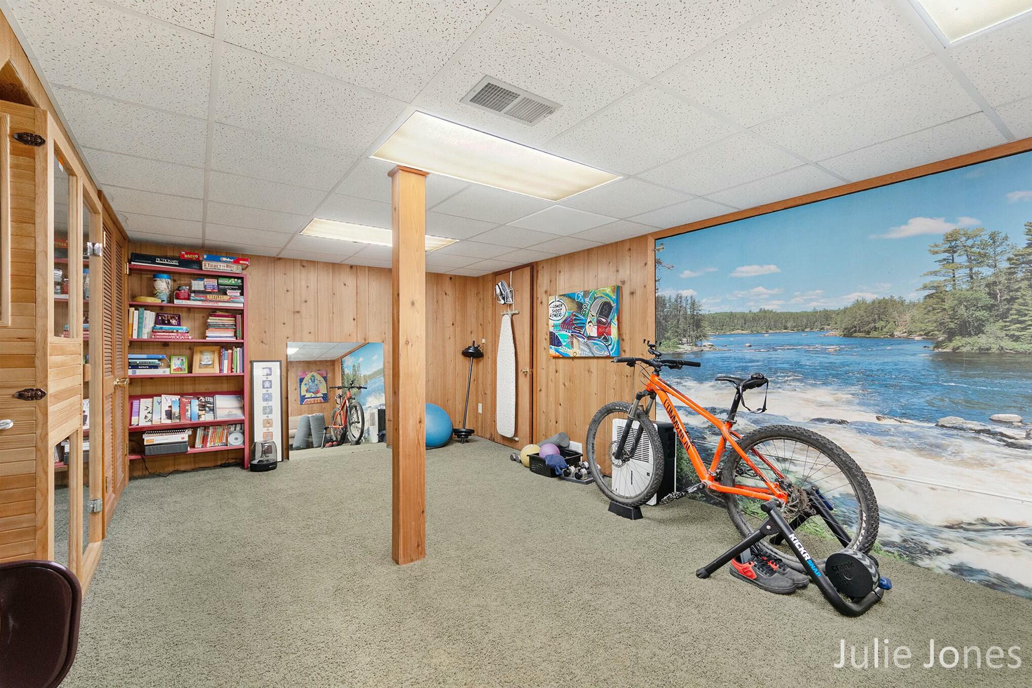 3631 13 Mile Road Northwest Sparta, MI 49345 - Photo 23 of 41 lower level rec room