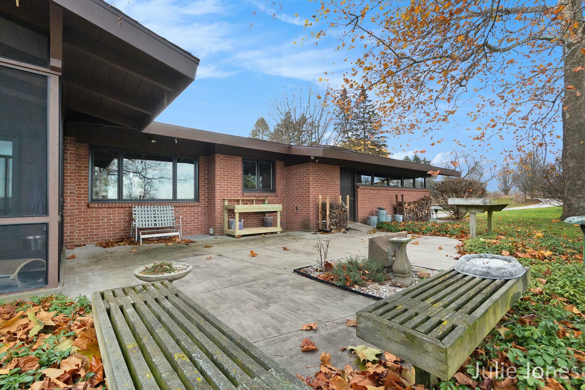 3631 13 Mile Road Northwest Sparta, MI 49345 - Photo 26 of 41 back patio