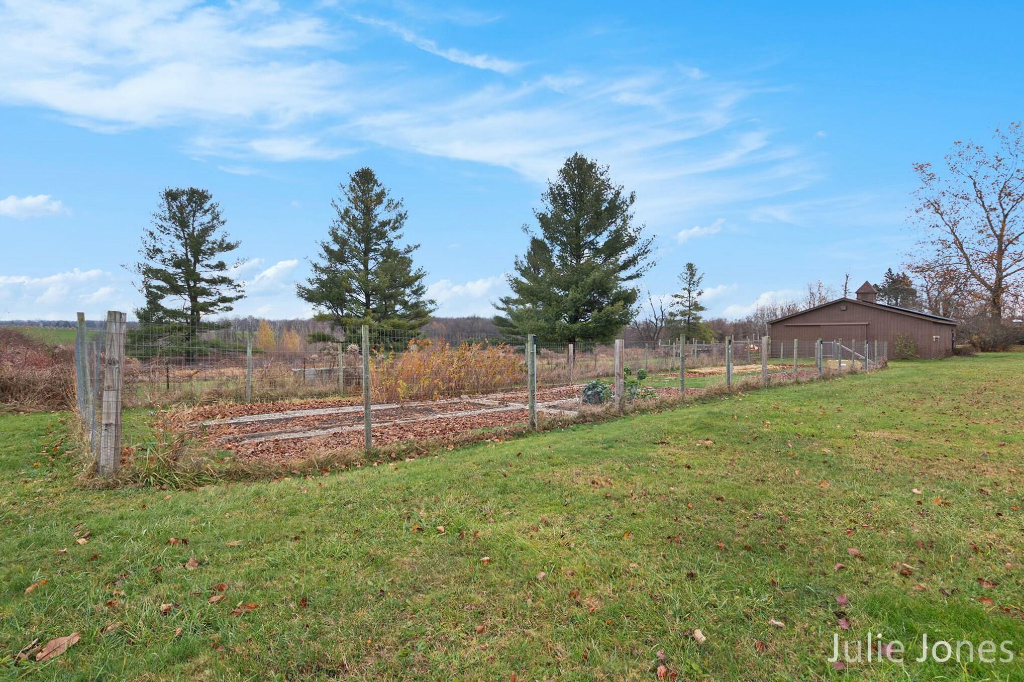 3631 13 Mile Road Northwest Sparta, MI 49345 - Photo 30 of 41 fenced garden area