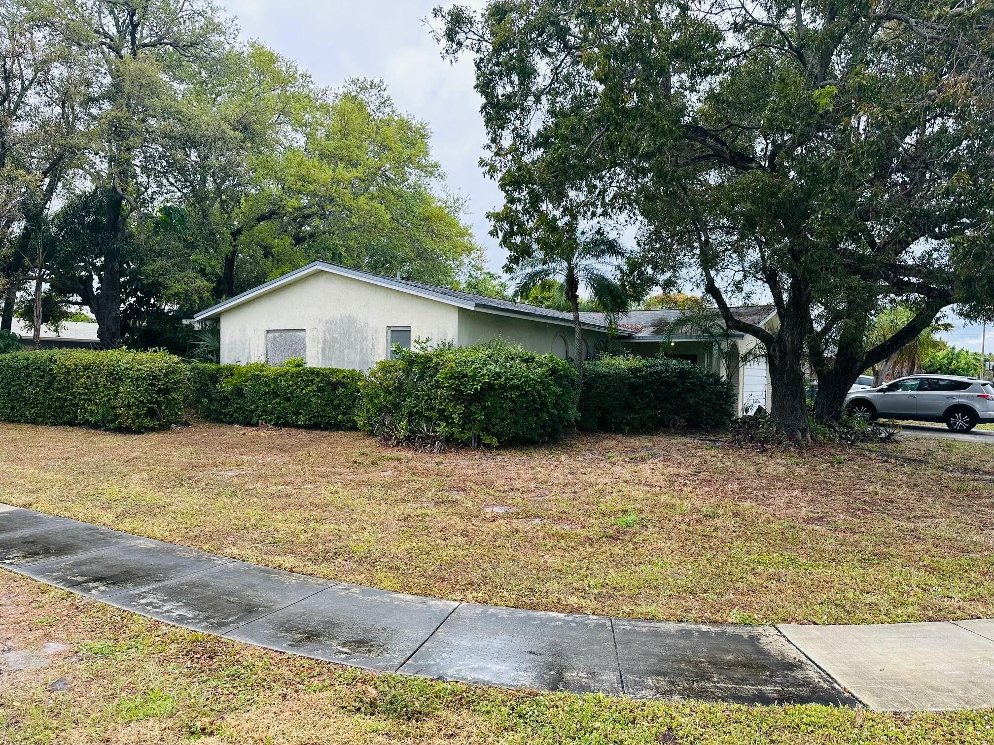 679 Southwest 17th Court Boca Raton, FL 33486 - Photo 2 of 6 Corner lot