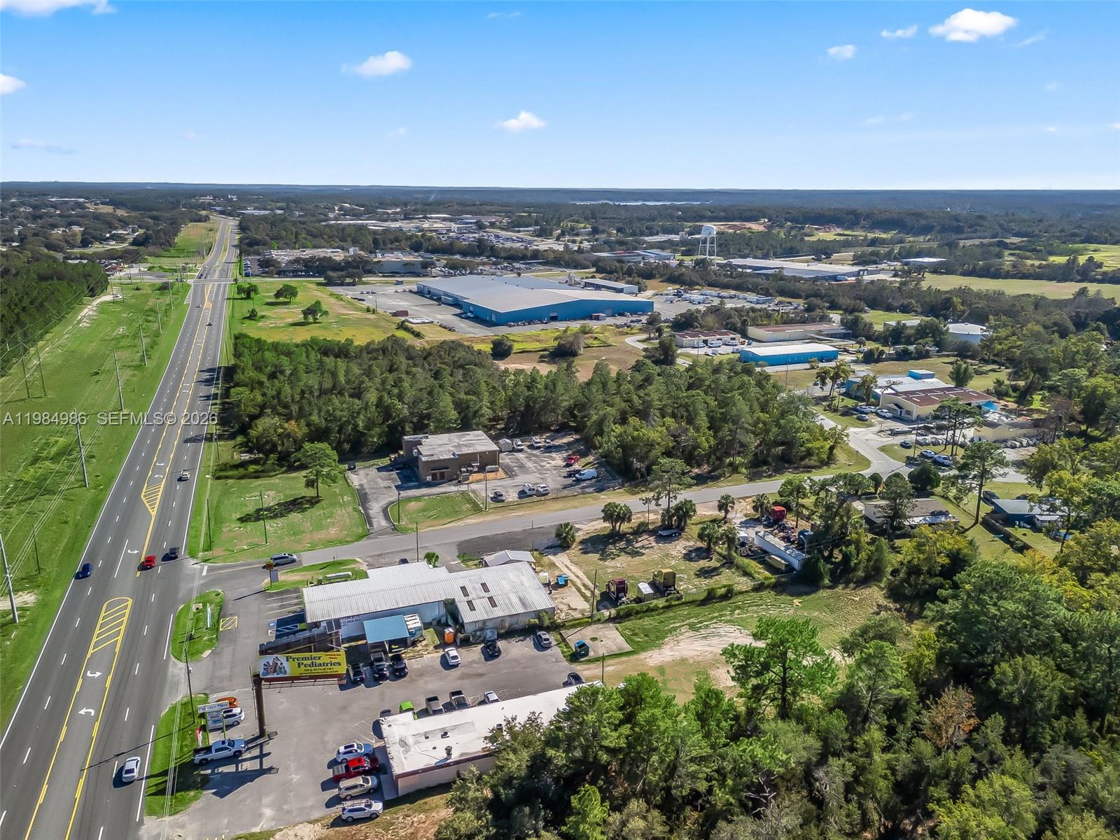 9594 Southeast Maricamp Road Ocala, FL 34472 - Photo 3 of 45 an aerial view of multiple house