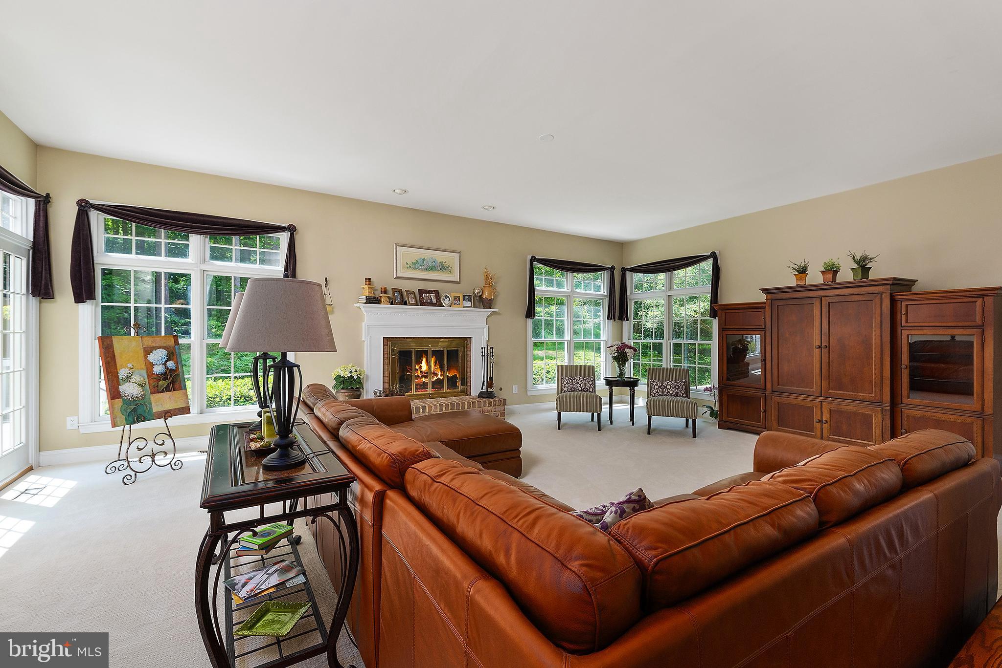 3203 Homewood Road Davidsonville, MD 21035 - Photo 12 of 49 Family room with wood burning fireplace