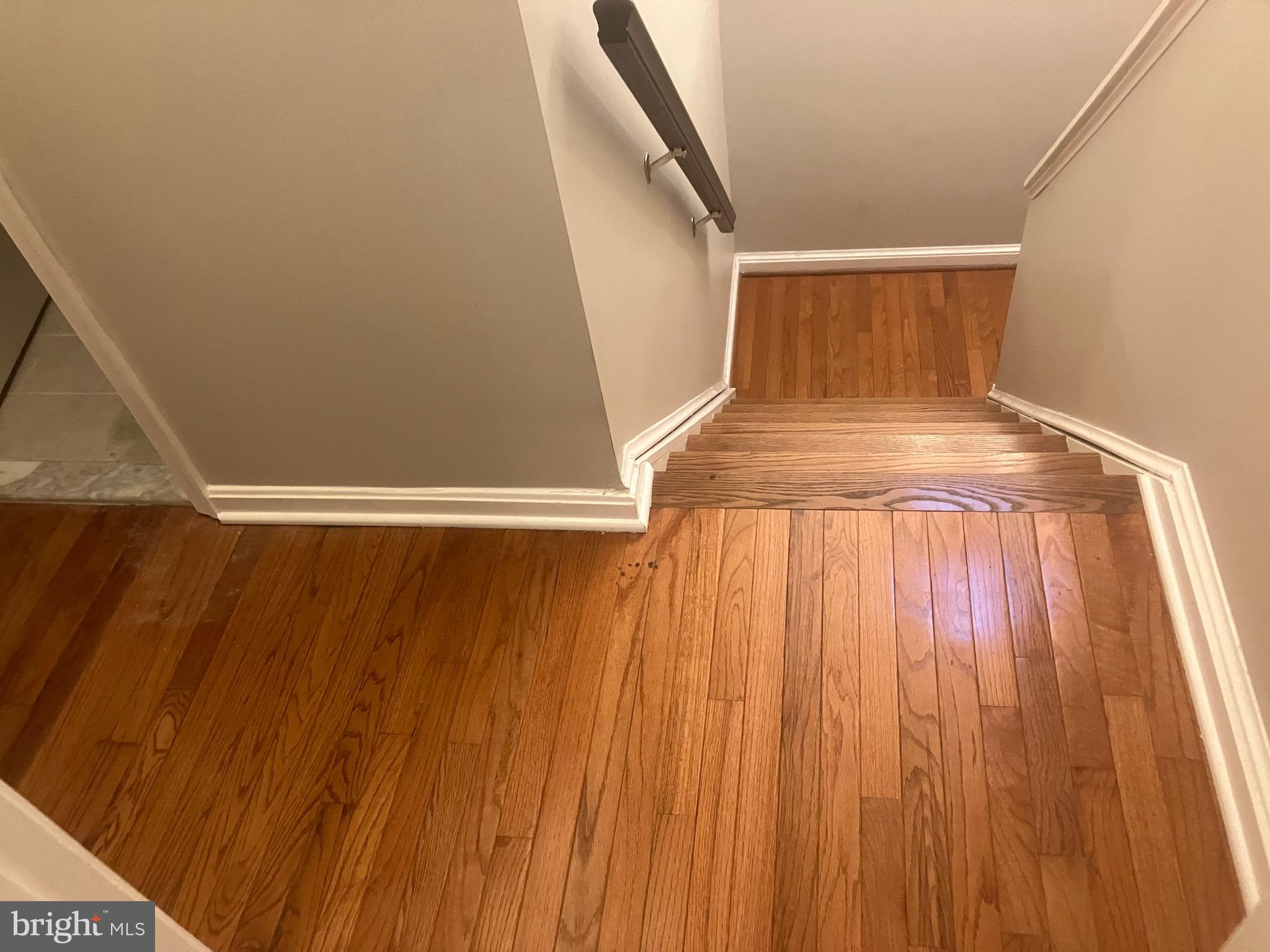 105 Oak Shade Road Gaithersburg, MD 20878 - Photo 7 of 16 Warming Hardwoods on main & Upper Level
