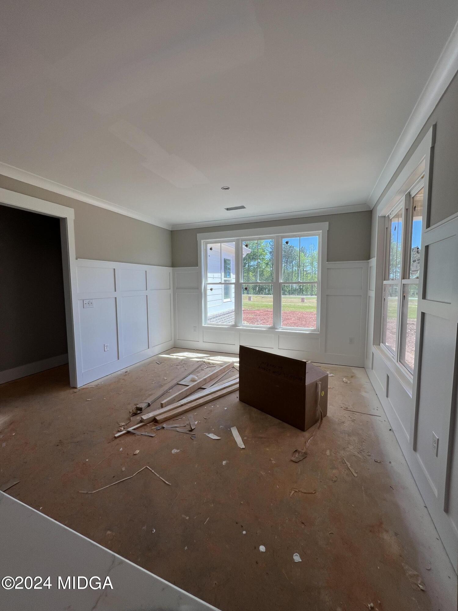 208 Copper Crossing Forsyth, GA 31029 - Photo 13 of 23 a view of an empty room with a window