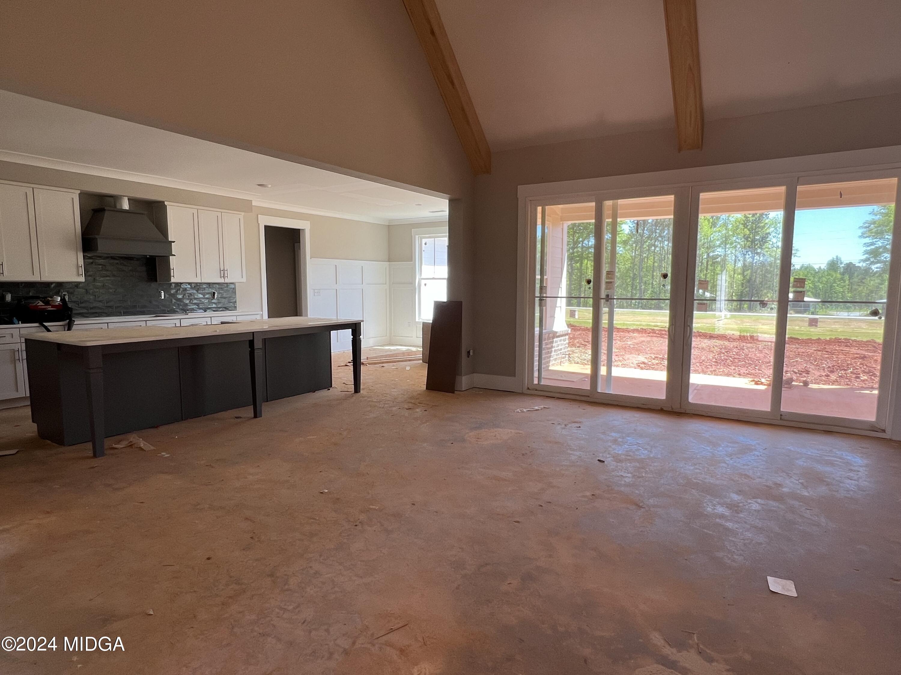 208 Copper Crossing Forsyth, GA 31029 - Photo 14 of 23 a view of a kitchen with furniture and a sink