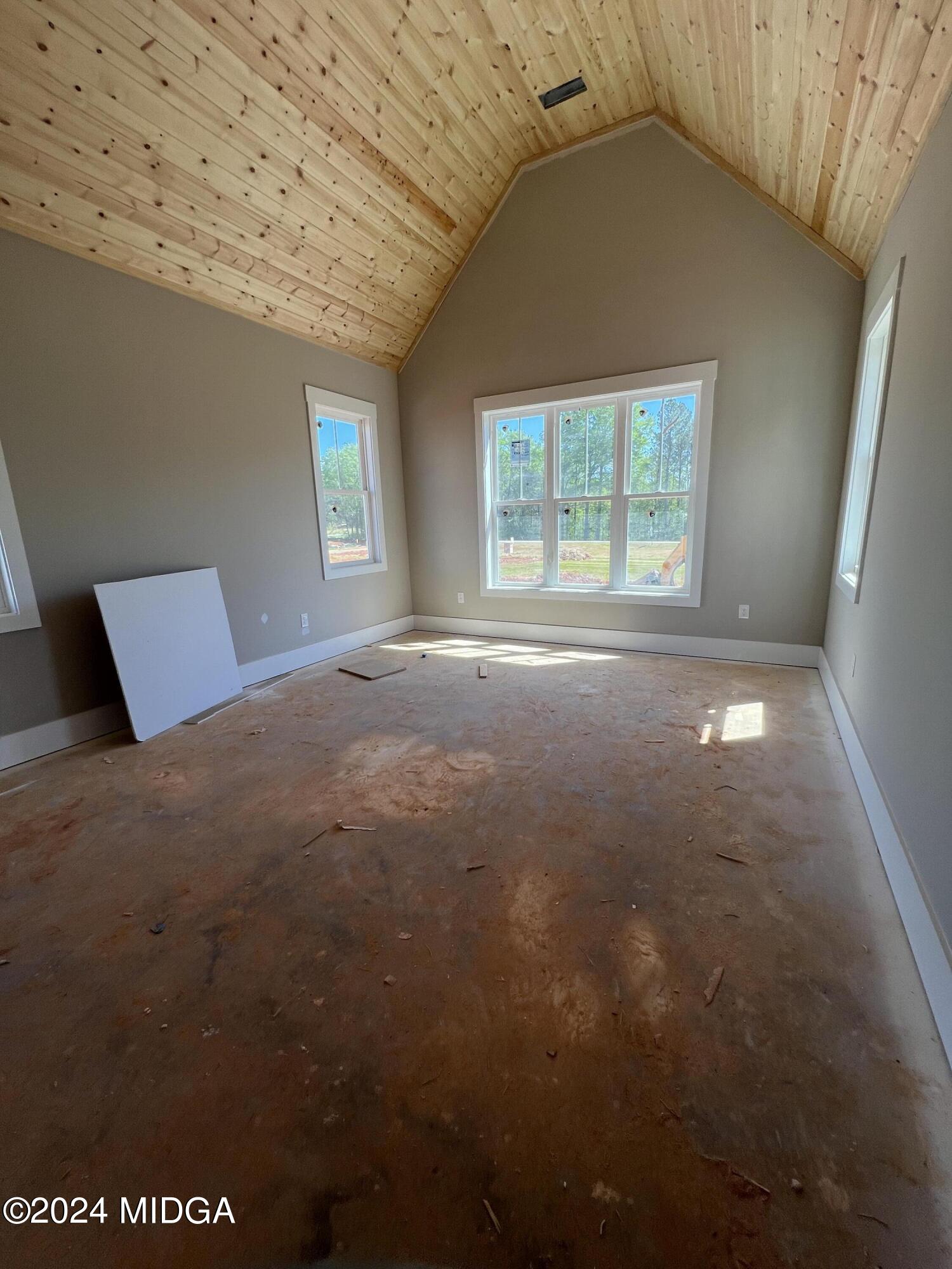 208 Copper Crossing Forsyth, GA 31029 - Photo 18 of 23 a view of an empty room with a window