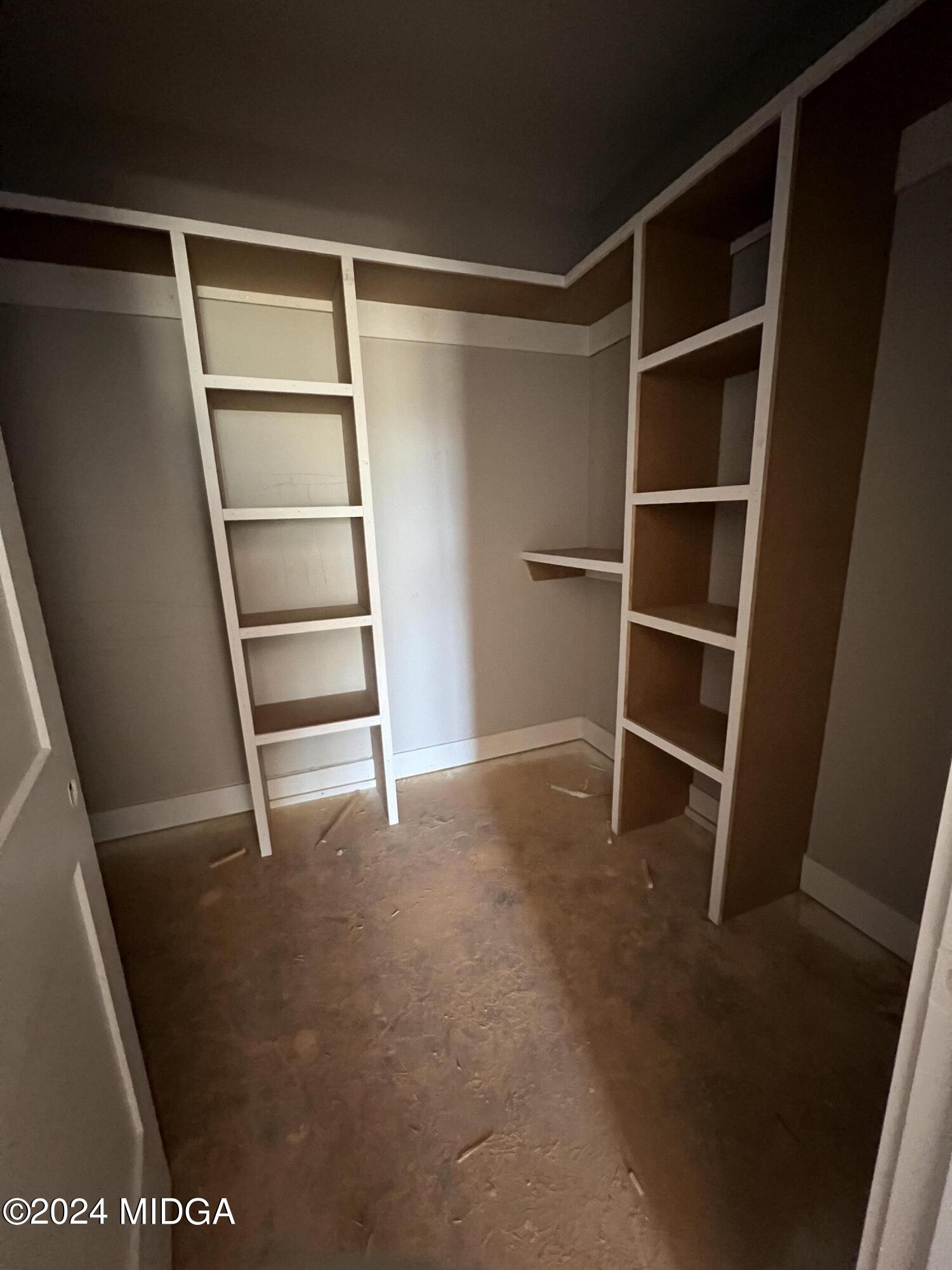 208 Copper Crossing Forsyth, GA 31029 - Photo 19 of 23 a view of an empty walk in closet