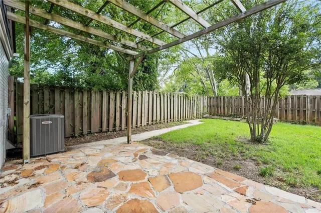 a view of a backyard with a small cabin