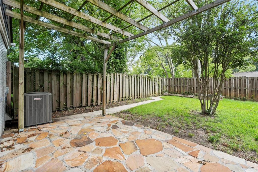 481 Griffin Street Northwest Atlanta, GA 30318 - Photo 20 of 30 a view of a backyard with a small cabin