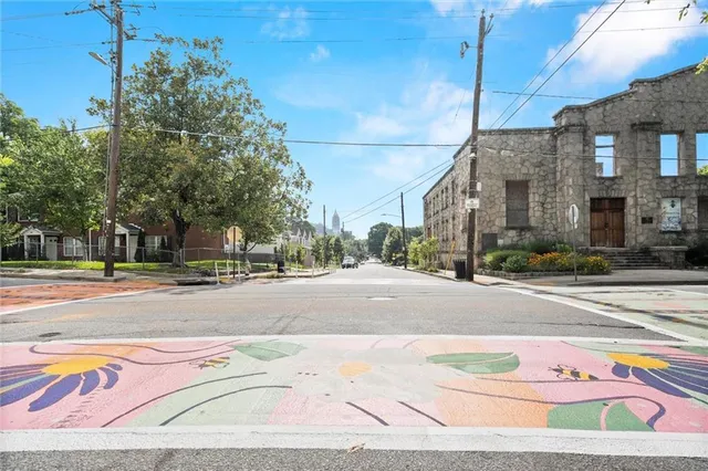 a view of a street with houses