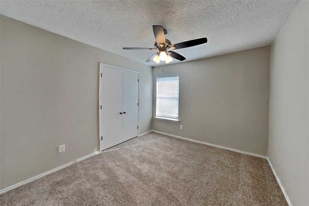 1924 Overland Street Fort Worth, TX 76131 - Photo 16 of 27 wooden floor in an empty room
