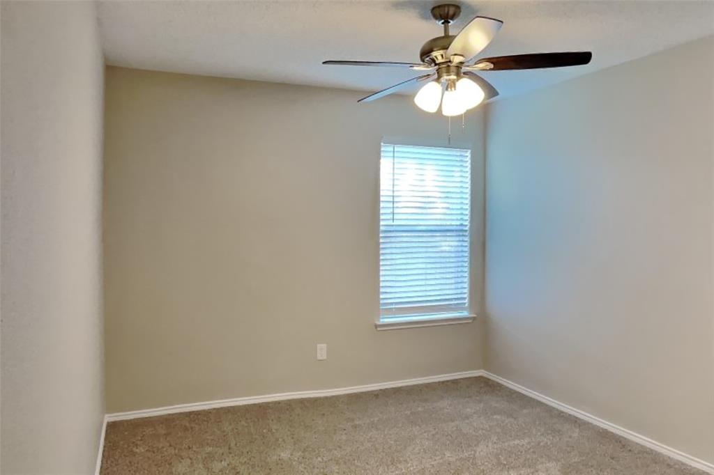 1924 Overland Street Fort Worth, TX 76131 - Photo 18 of 27 a view of an empty room with a window